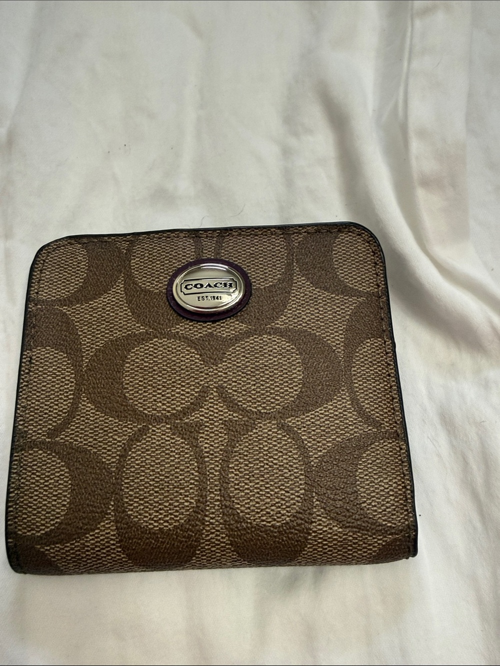 Coach Signature Canvas Bi-Fold Wallet in Brown